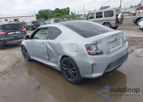 2014 Scion Tc 10 Series/Monogram z USA, uszkodzony, nr VIN JTKJF5C71E3072185